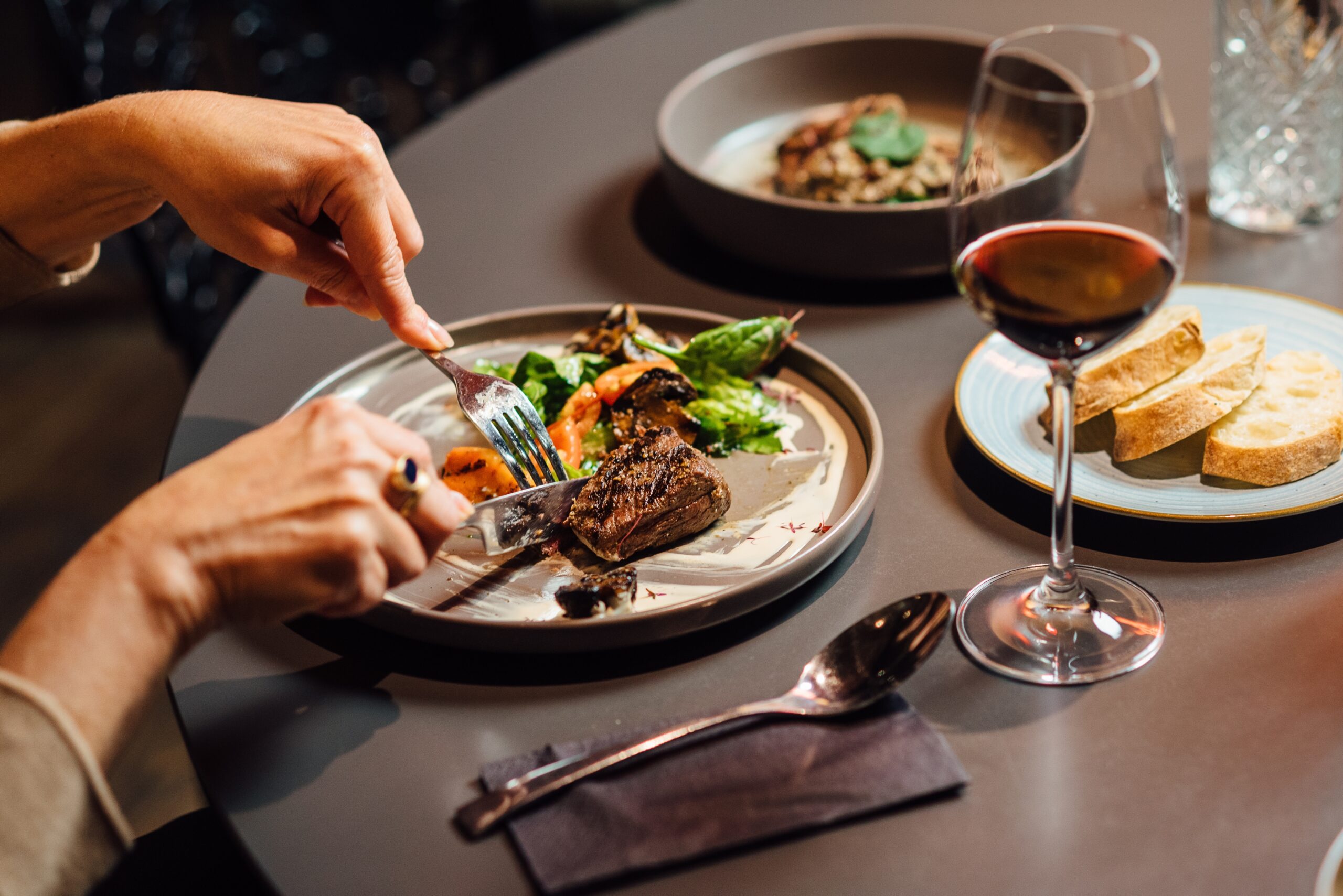 Museum café with art, dining, and cultural visitors